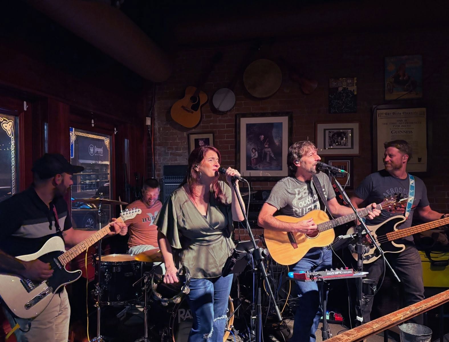 Vocalists and musicians performing together live