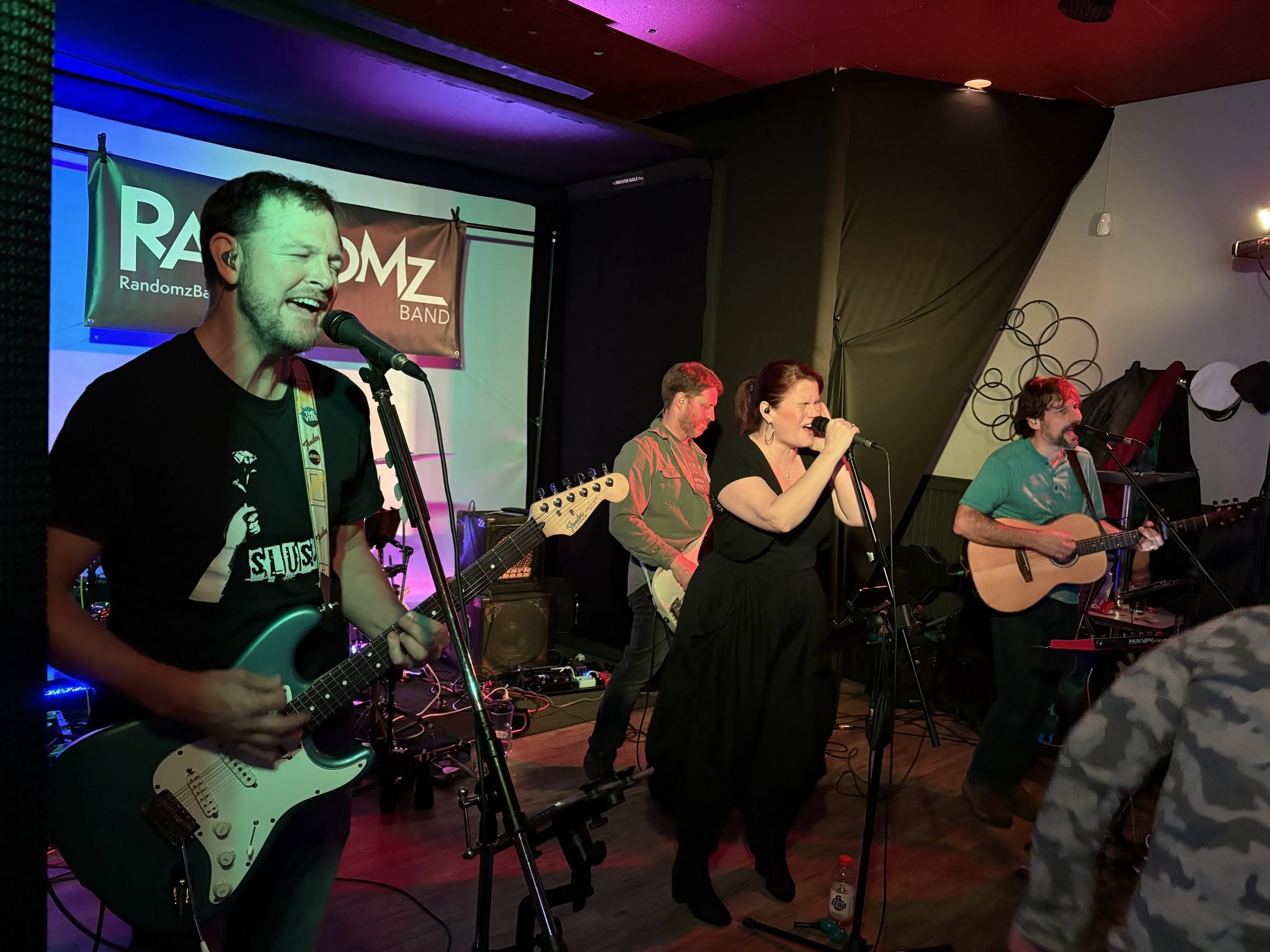 Randomz Band vocalists performing live